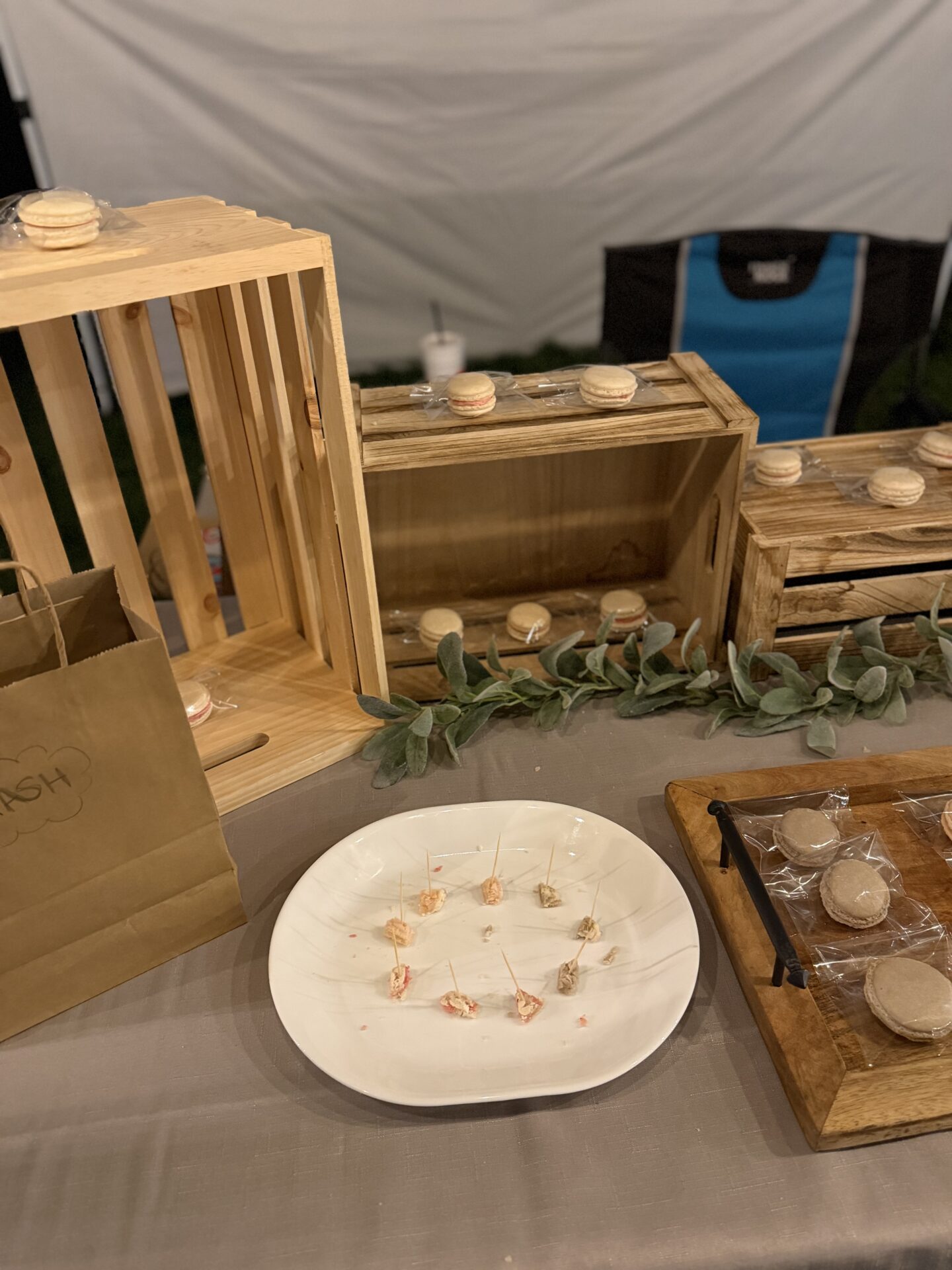 Handmade macarons displayed at Kaitlyn's farmers market booth